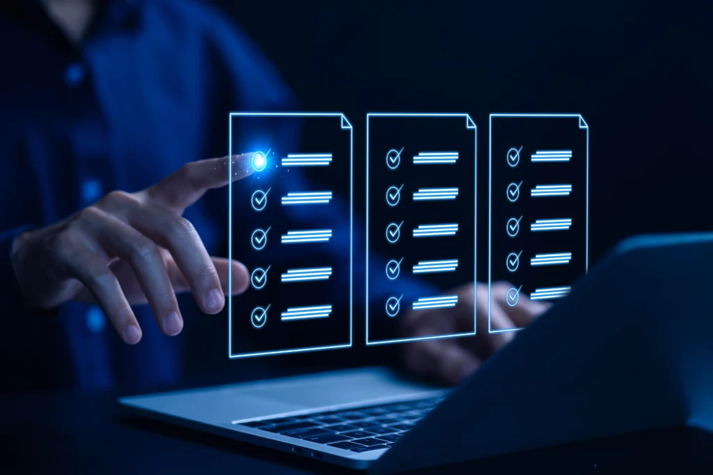 Man pointing finger and pressing check marks on hologram document above laptop to depict Microsoft Purview solving a lot of problems.